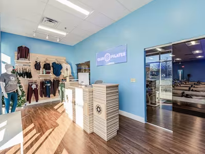 Club Pilates Front Desk and Workout Area