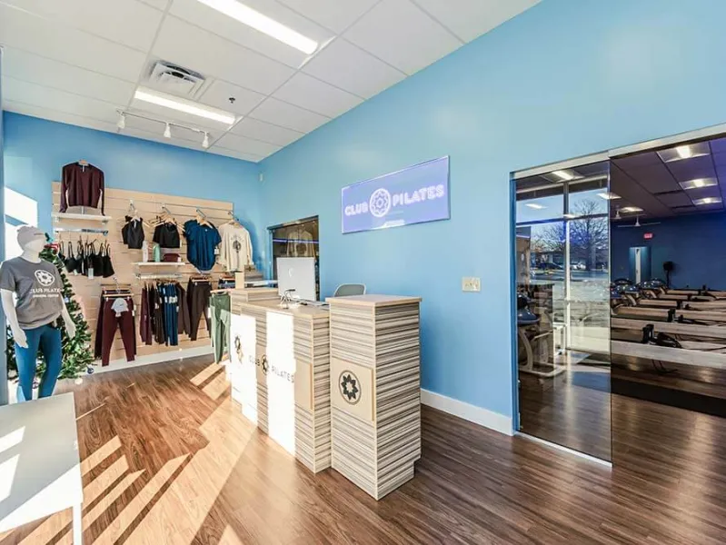 Club Pilates Front Desk and Workout Area